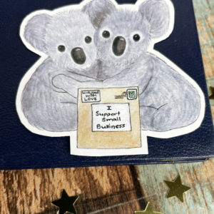 Die-Cut Glossy Sticker of Koalas supporting Small Business with a parcel